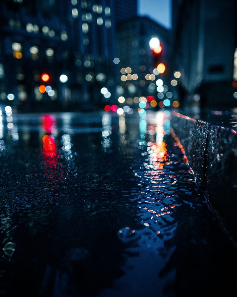 bokeh lights, wet, gutter, street gutter, street, pavement, sidewalk, nature, bokeh, lights, night, dark, urban, city, city lights, night photography, street photography, rain